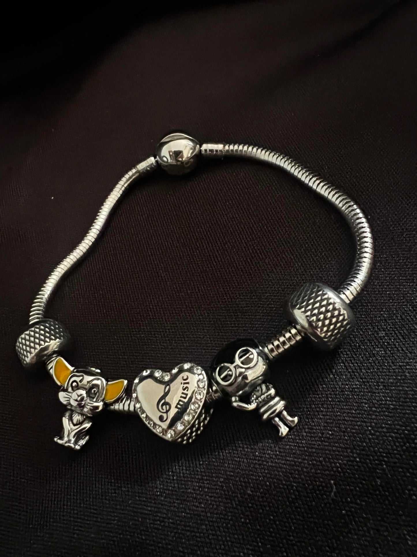 Disney snake bracelet with charms