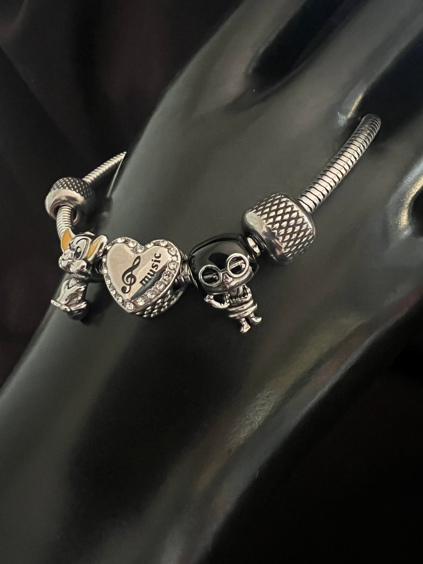 Disney snake bracelet with charms