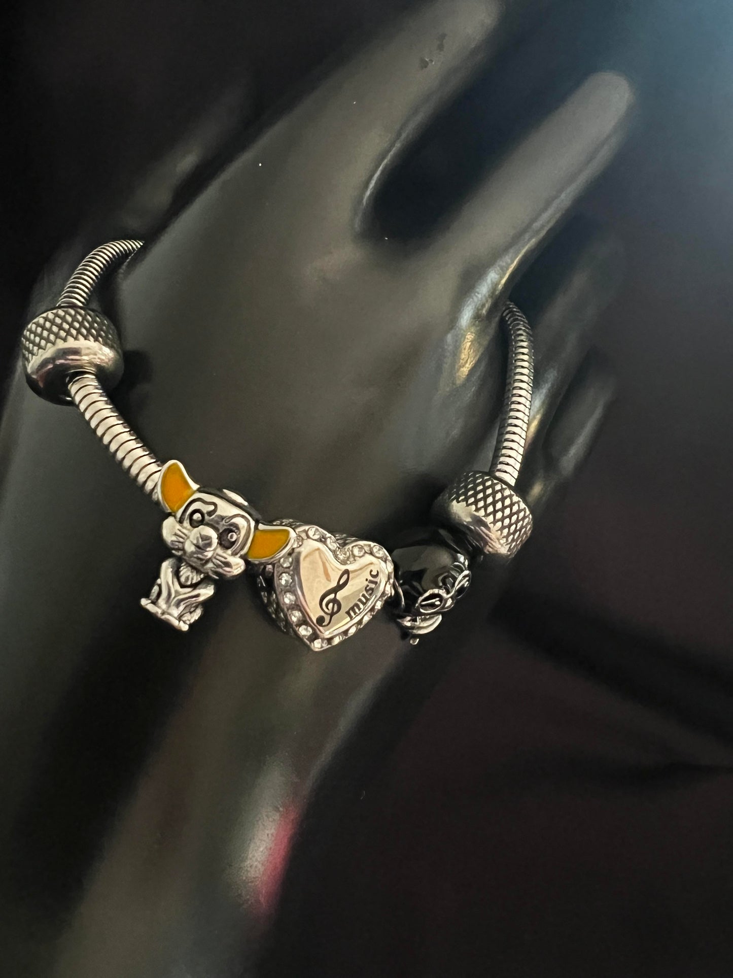 Disney snake bracelet with charms