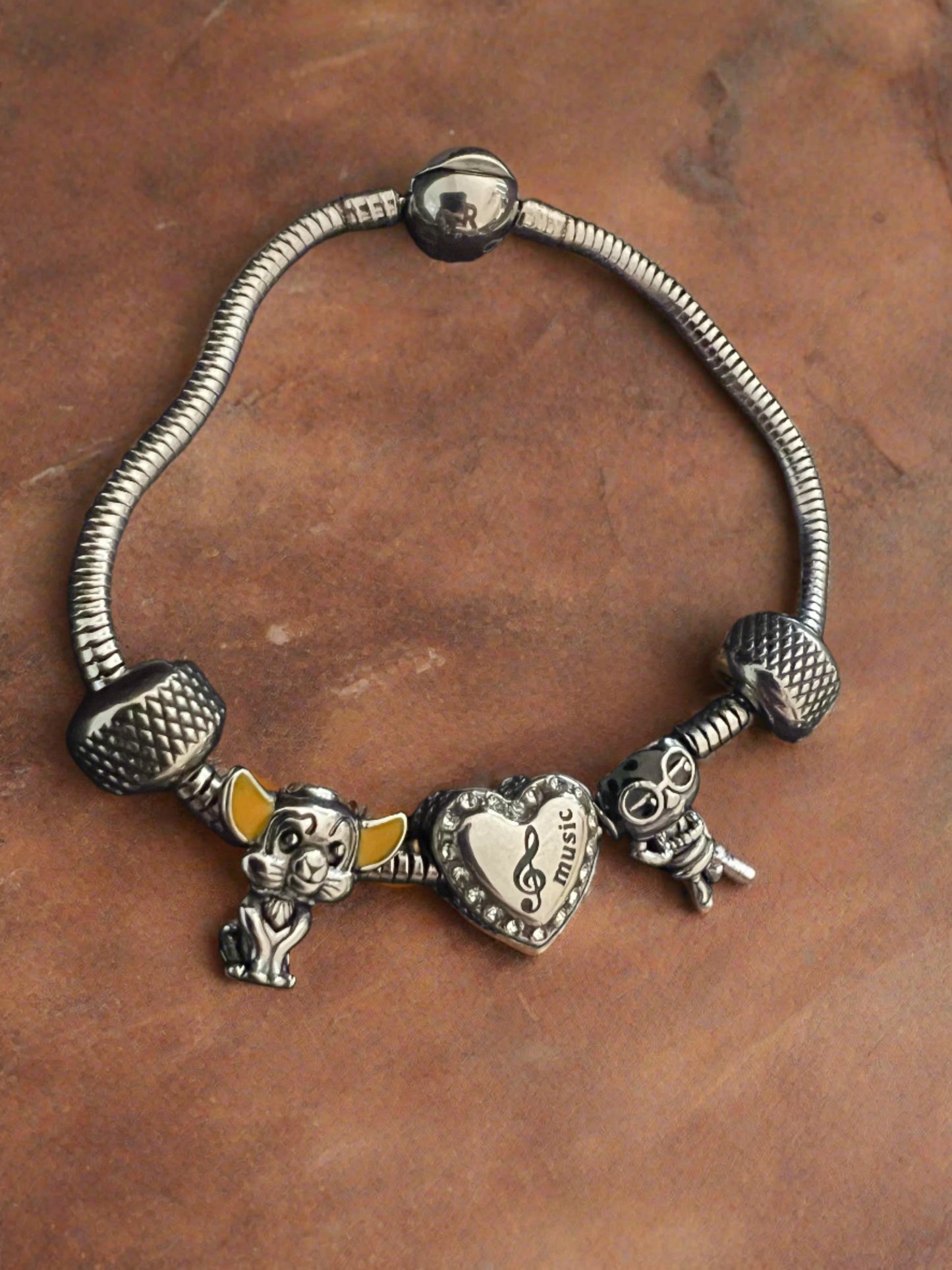 Disney snake bracelet with charms