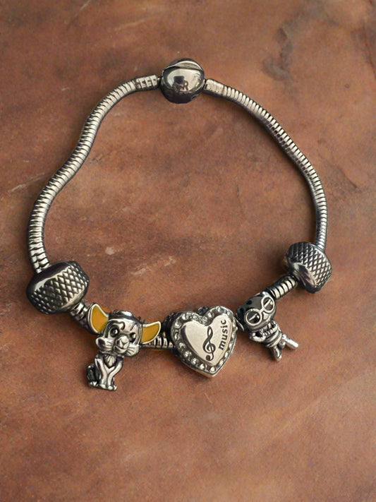 Disney snake bracelet with charms